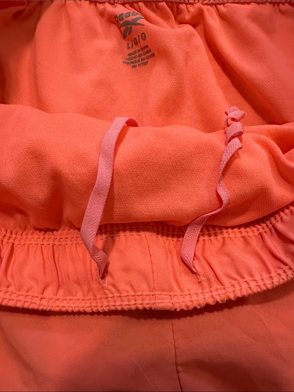 Reebok Women's Coral-Orange Athletic Shorts with Black Trim - Picture 4 of 6